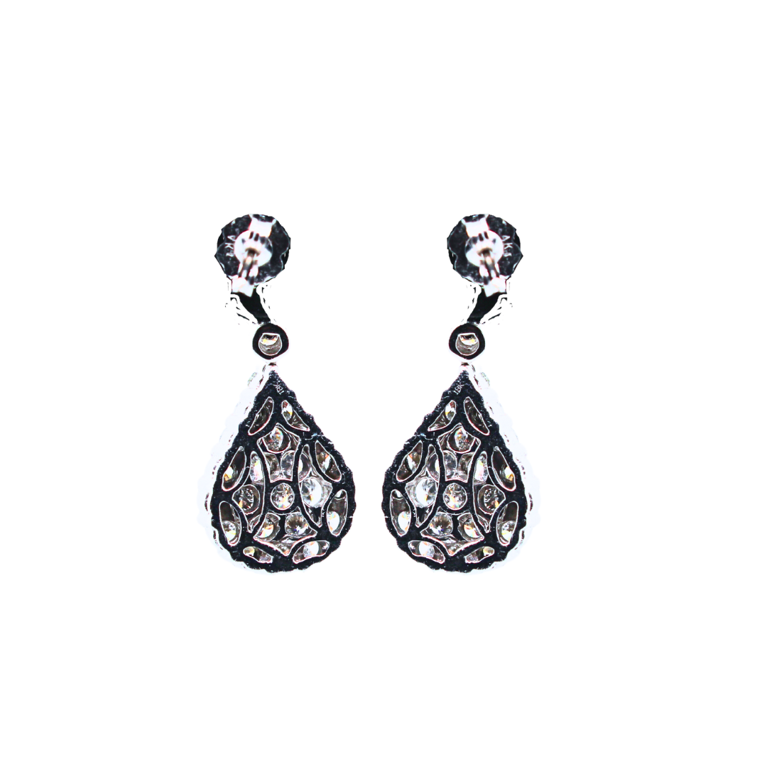 18k White Gold Greg Ruth Pear Shape Dangling Earrings