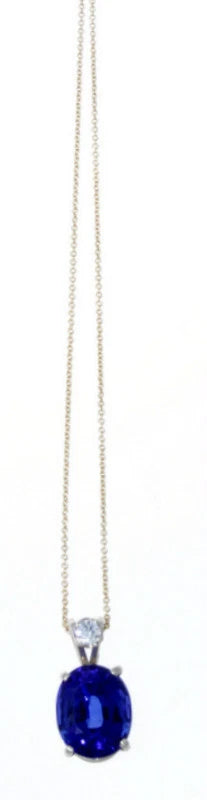 14K YELLOW GOLD, DIAMOND & OVAL TANZANITE PENDANT 15.40 TCW.