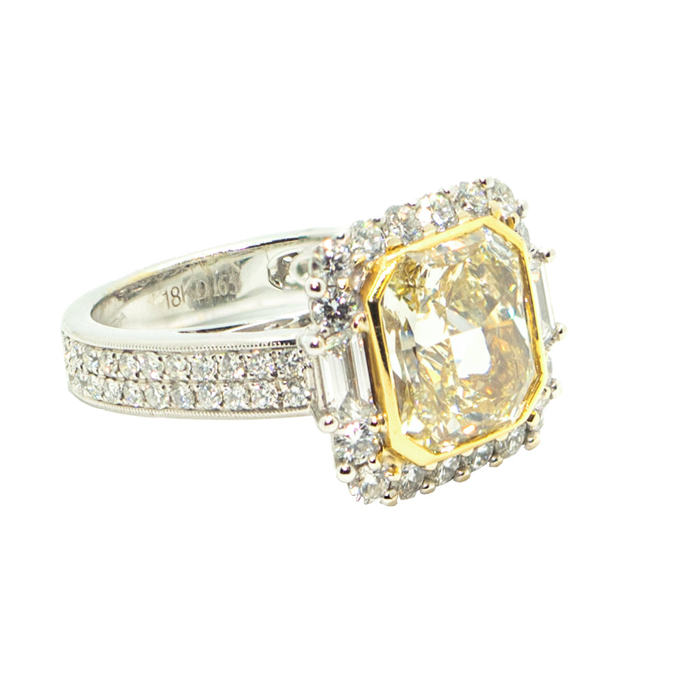 18KWYG FANCY YELLOW RADIANT CUT DIAMOND RING