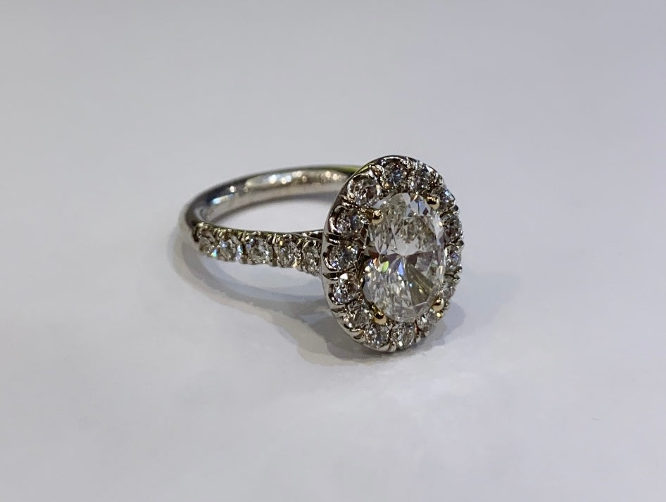 18K WHITE GOLD, OVAL CUT DIAMOND WITH HALO ENGAGEMENT RING