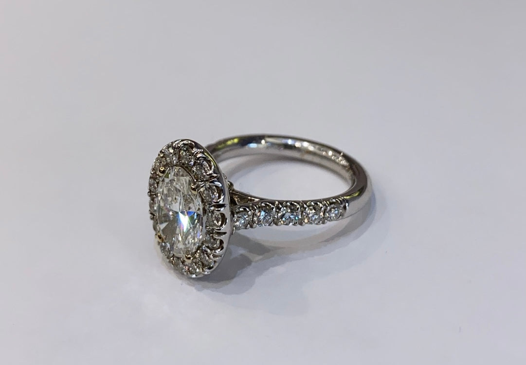 18K WHITE GOLD, OVAL CUT DIAMOND WITH HALO ENGAGEMENT RING