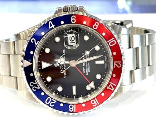 Rolex GMT-Master II Stainless Steel Pepsi 40MM Ref# 16710 W/Papers