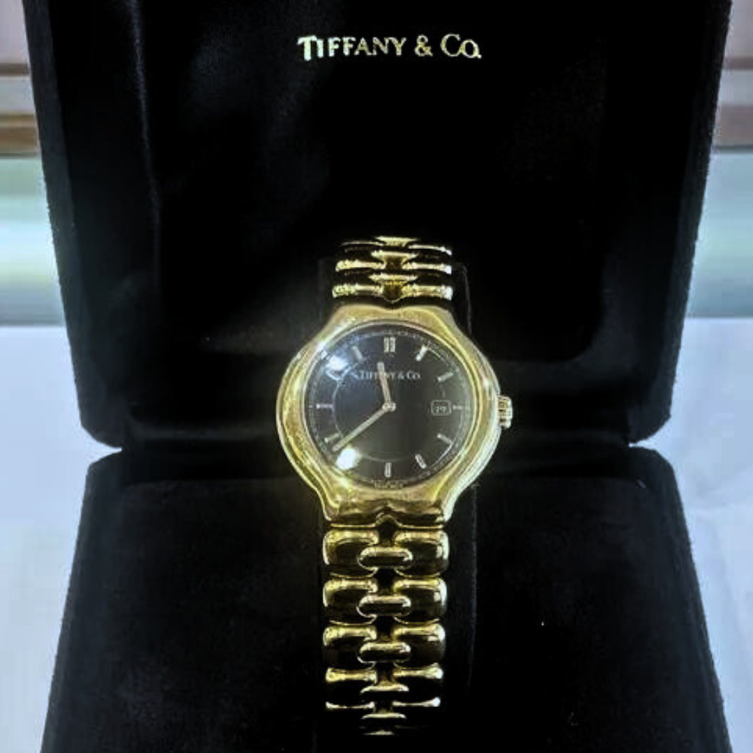 Tiffany & Company 18K Yellow Gold Tesoro Quartz Wristwatch 34MM Blackface M0133