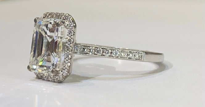 18K WHITE GOLD, EMERALD CUT WITH DIAMOND HALO, ENGAGEMENT RING