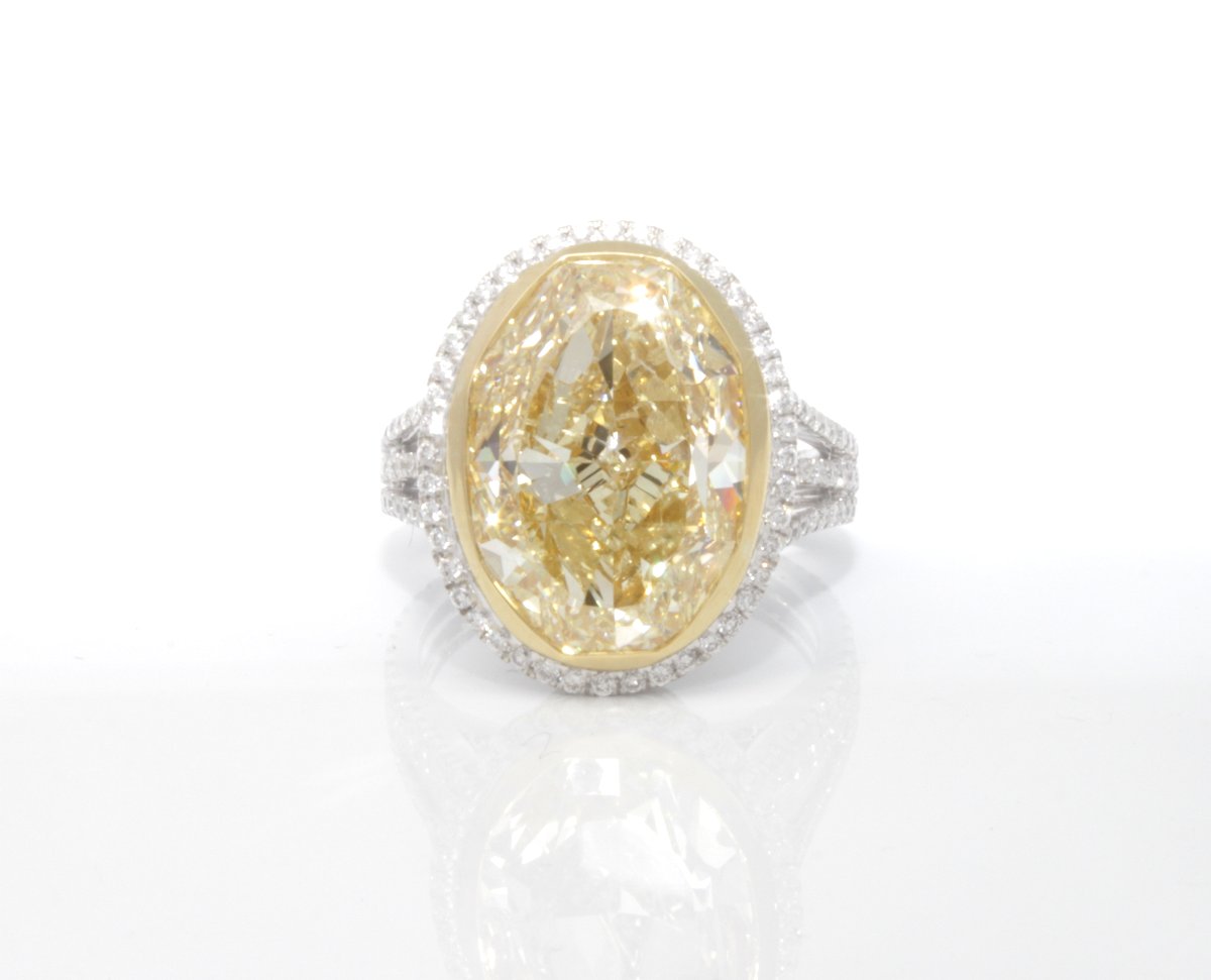 18KYWG OVAL CUT YELLOW DIAMOND RING